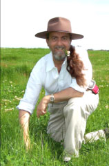 Richard Graham, Landtasia Organic Farm Founder. on certified grass-fed beef pasture.